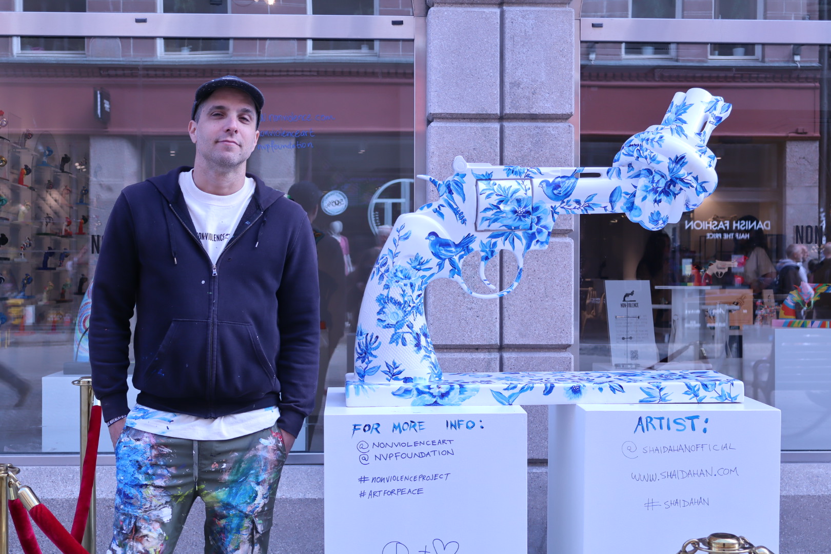 Non-Violence ambassador Shai Dahan with The Knotted Gun sculpture for Non-Violence Project Foundation