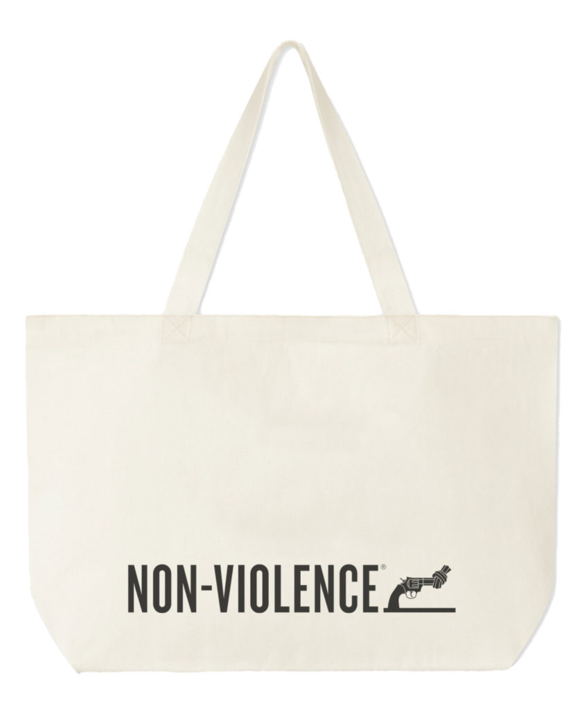 Non-Violence Tote bag designed with a Non-Violence logo on the front.