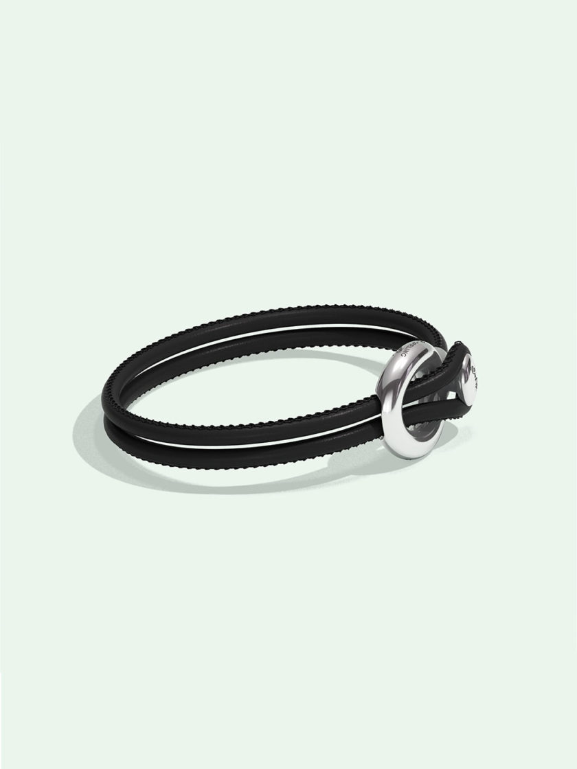 Imagine black leather bracelet by Orrling in a side view created in collaboration with the Non-Violence Project.