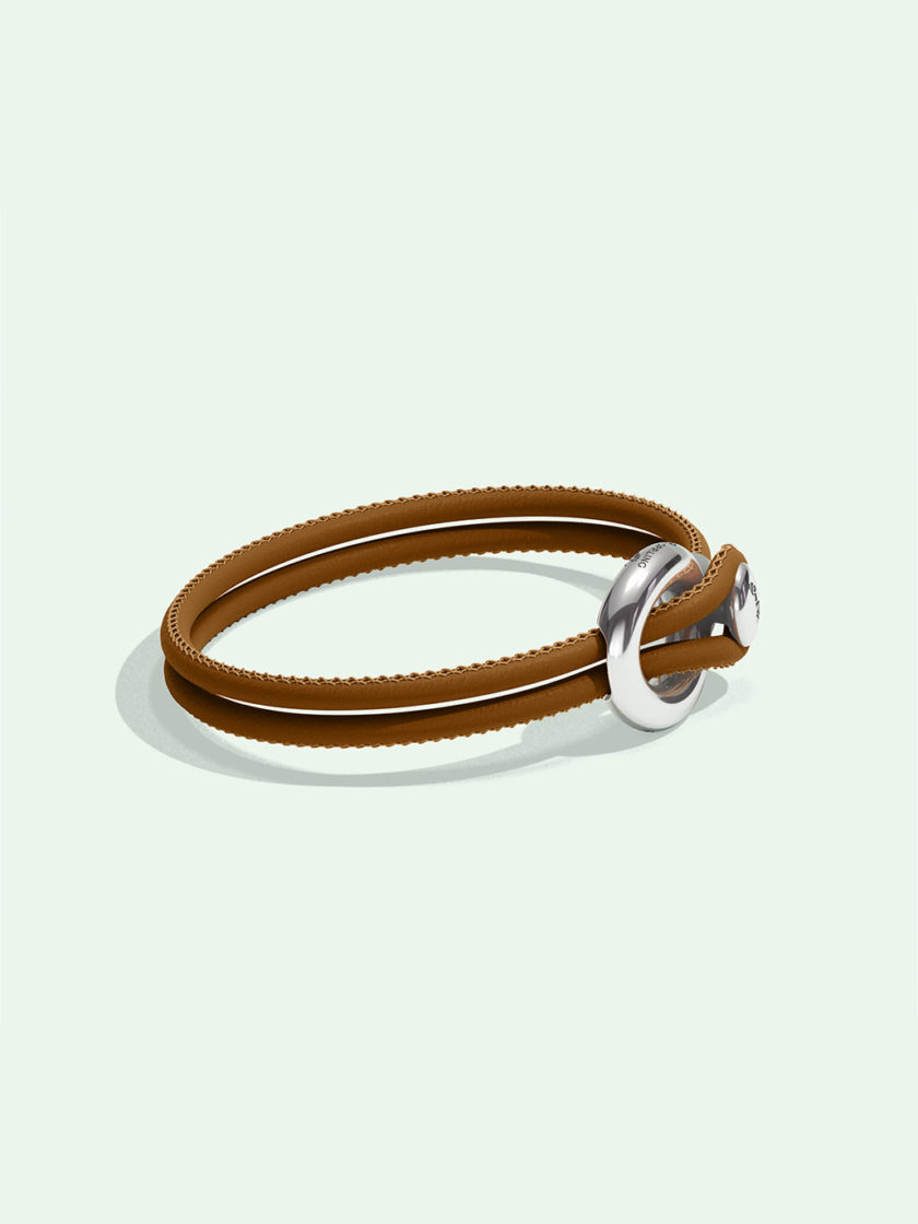 Imagine brown leather bracelet by Orrling in a side view created in collaboration with the Non-Violence Project.