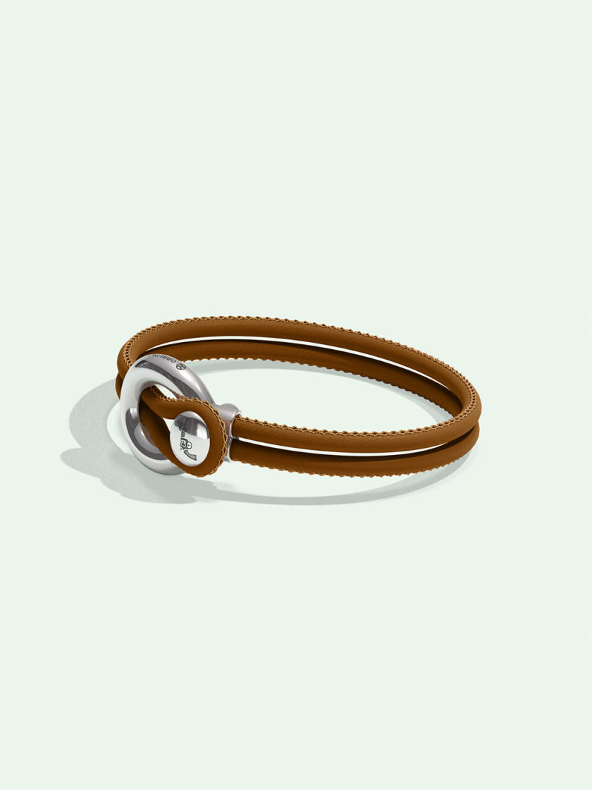 Imagine brown leather bracelet by Orrling in a side view created in collaboration with the Non-Violence Project.