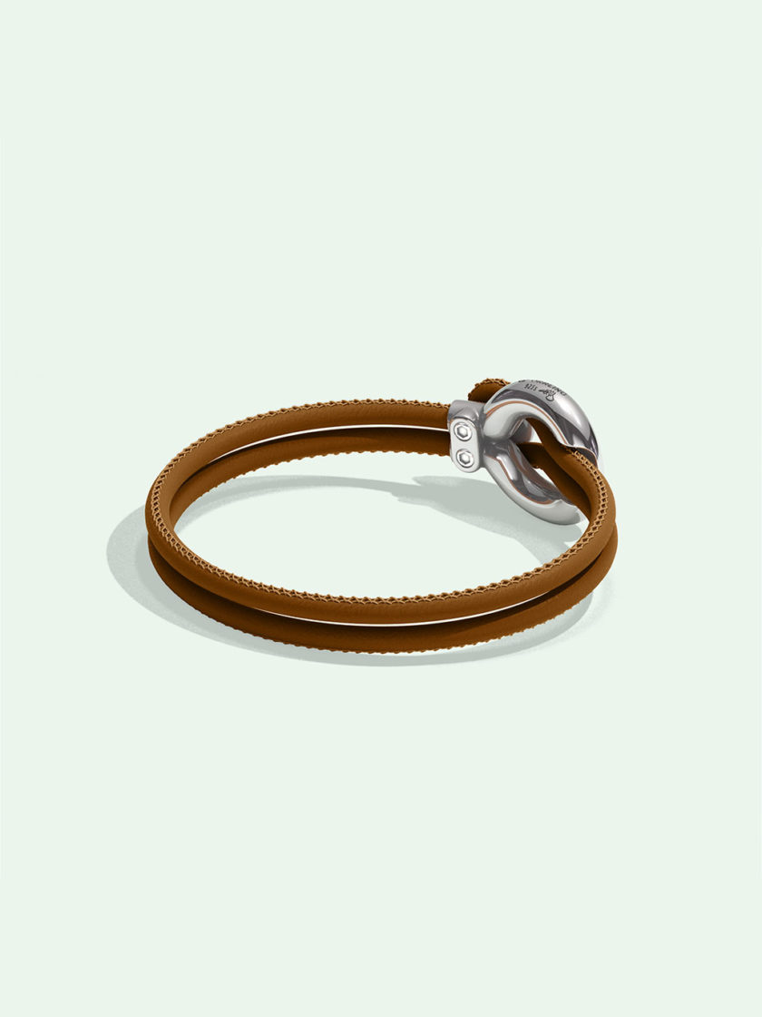 Imagine brown leather bracelet by Orrling in a back view created in collaboration with the Non-Violence Project.