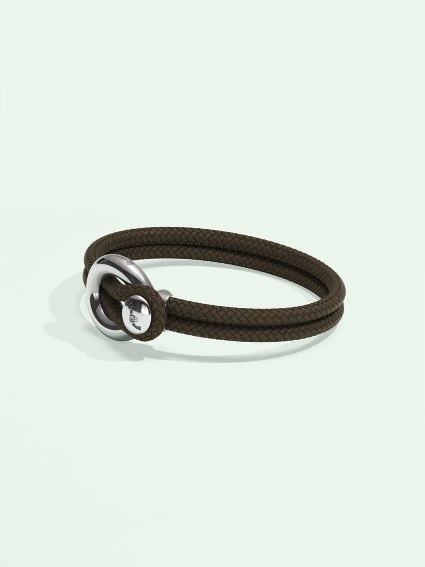 Imagine brown nylon bracelet by Orrling in a side view created in collaboration with the Non-Violence Project.
