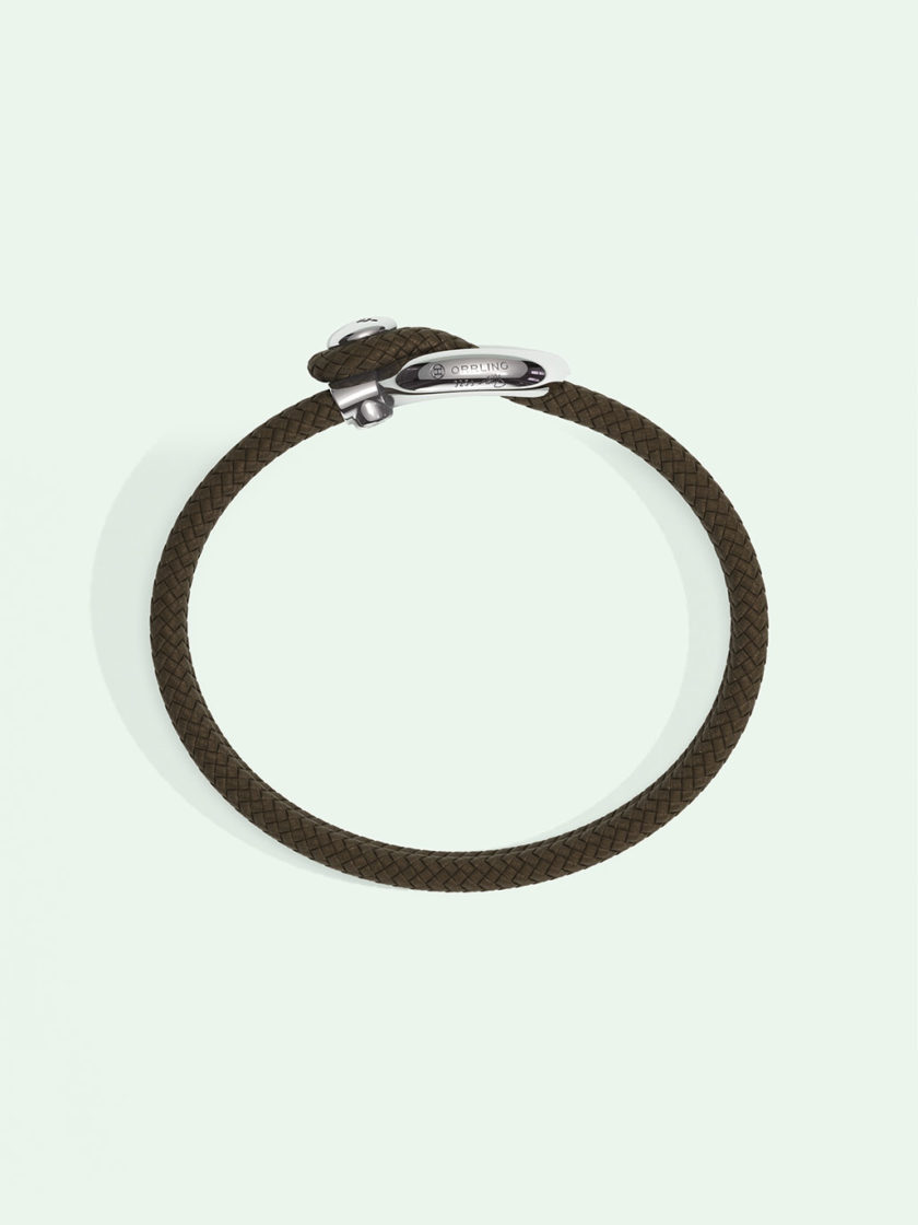 Imagine brown nylon bracelet by Orrling in a top view created in collaboration with the Non-Violence Project.